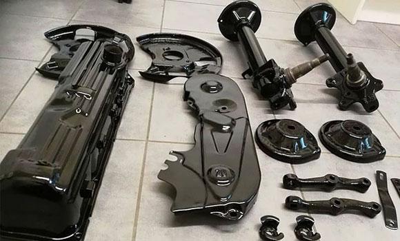 Powder coated vehicle wheel