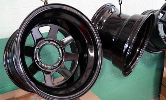 Powder coated vehicle part